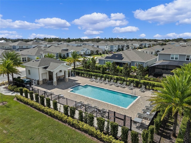 view of pool featuring a patio and a lawn