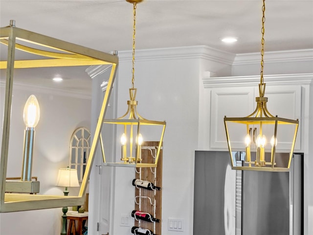 interior details featuring crown molding and a chandelier