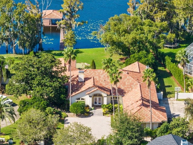 birds eye view of property featuring a water view