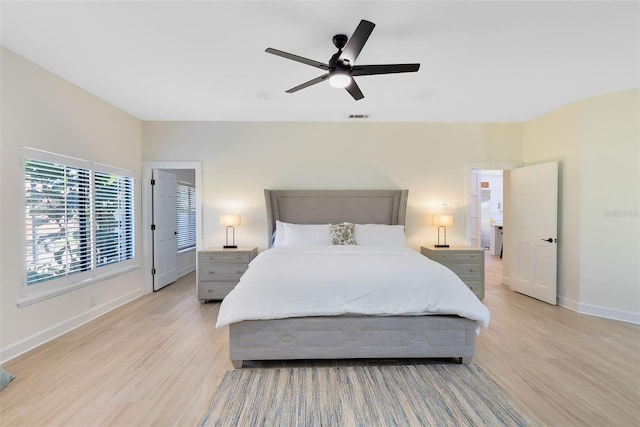 bedroom featuring light wood-type flooring and ceiling fan