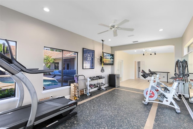 workout room featuring ceiling fan