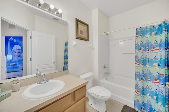 full bathroom with tile patterned flooring, vanity, shower / bath combo with shower curtain, and toilet