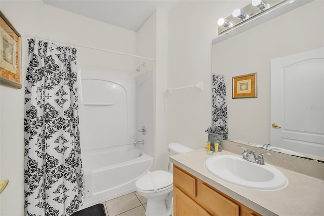 full bathroom with shower / bath combo, tile patterned floors, vanity, and toilet