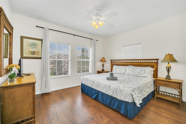 bedroom with dark wood-type flooring and ceiling fan