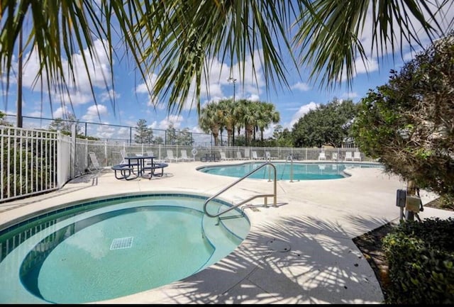 view of pool with a patio area