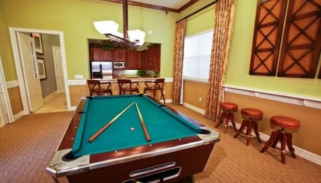 game room with light carpet, pool table, and crown molding