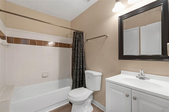 full bathroom with vanity, toilet, and shower / bath combination with curtain