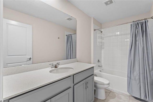 full bathroom with tile patterned flooring, vanity, toilet, and shower / bathtub combination with curtain