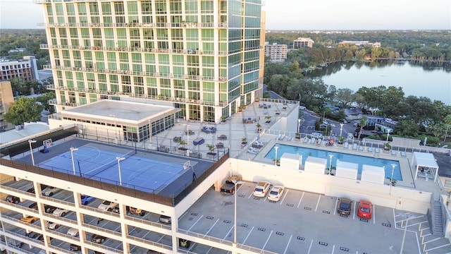 birds eye view of property with a water view