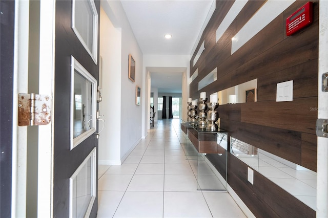 corridor featuring light tile patterned flooring