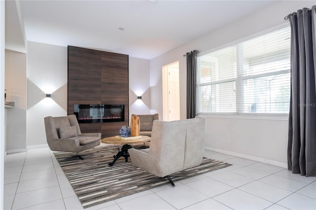 tiled living room with a large fireplace