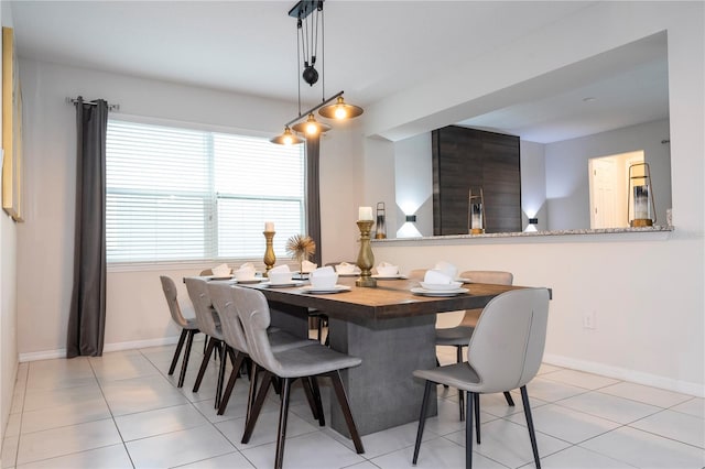 dining space with light tile patterned floors