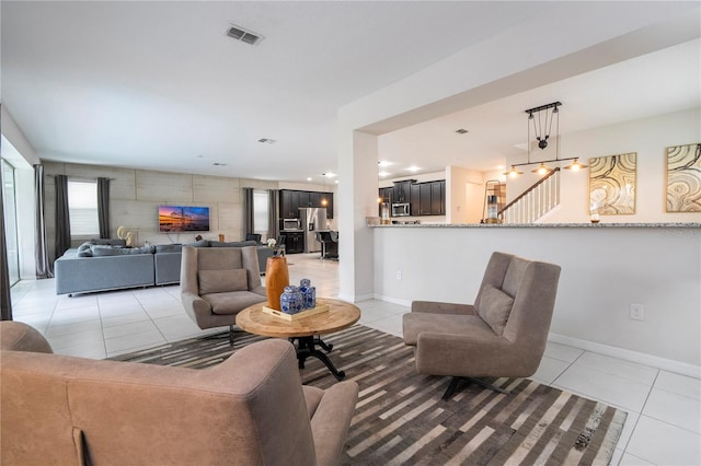 living room featuring light tile patterned floors