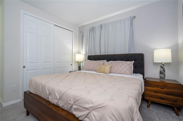 carpeted bedroom with a closet