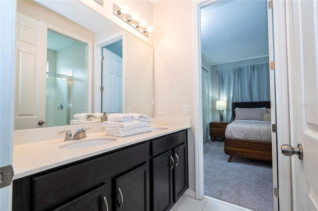 bathroom with walk in shower and vanity