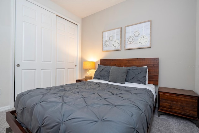 carpeted bedroom with a closet