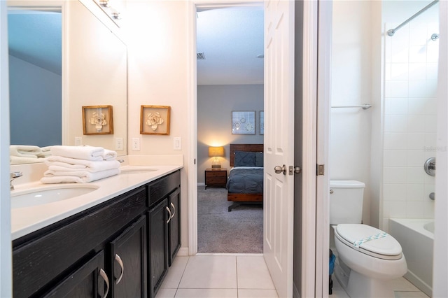 full bathroom featuring shower / bathing tub combination, tile patterned flooring, vanity, and toilet