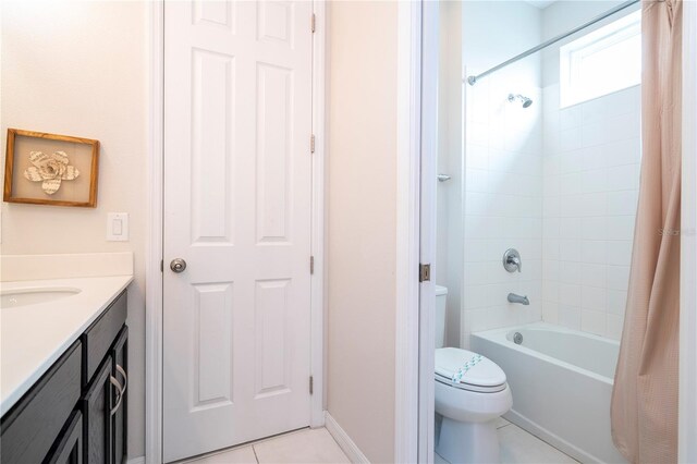 full bathroom with vanity, shower / bath combo with shower curtain, tile patterned floors, and toilet