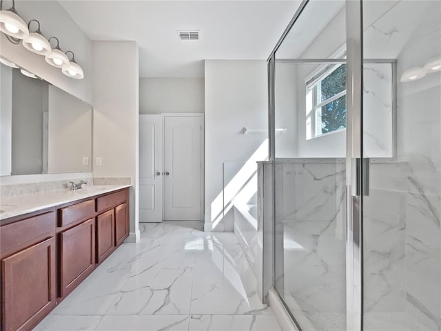 bathroom with vanity and walk in shower