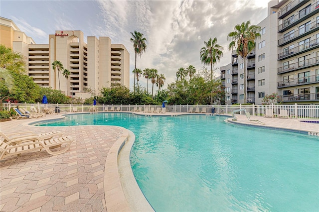 view of swimming pool with a patio area