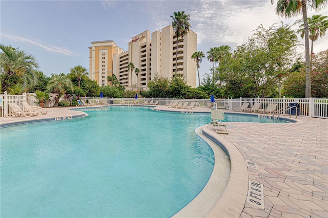 view of pool featuring a patio