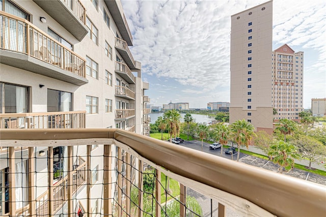 balcony featuring a water view