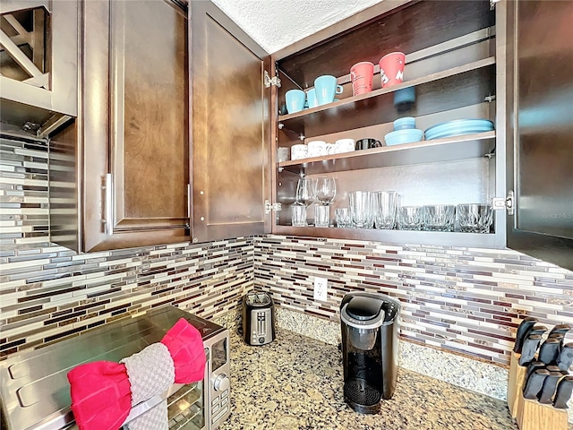 interior details featuring decorative backsplash