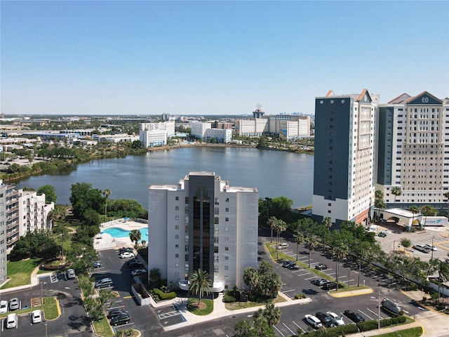 drone / aerial view with a water view and a view of city