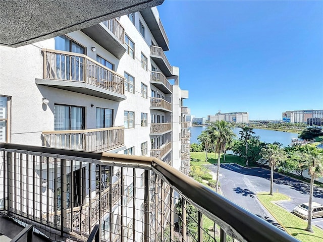 balcony featuring a water view