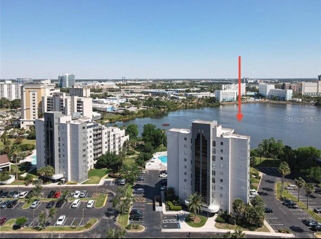 drone / aerial view with a water view and a city view