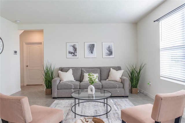 living room featuring light tile patterned floors