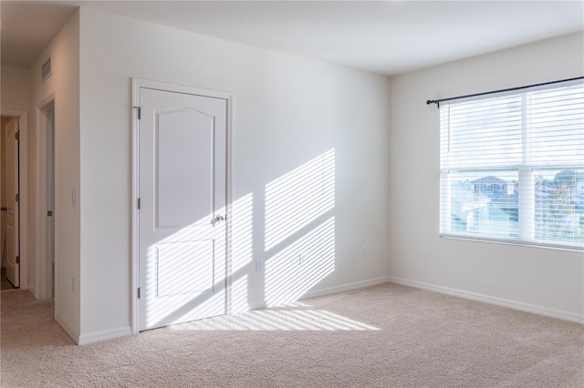 empty room with light carpet