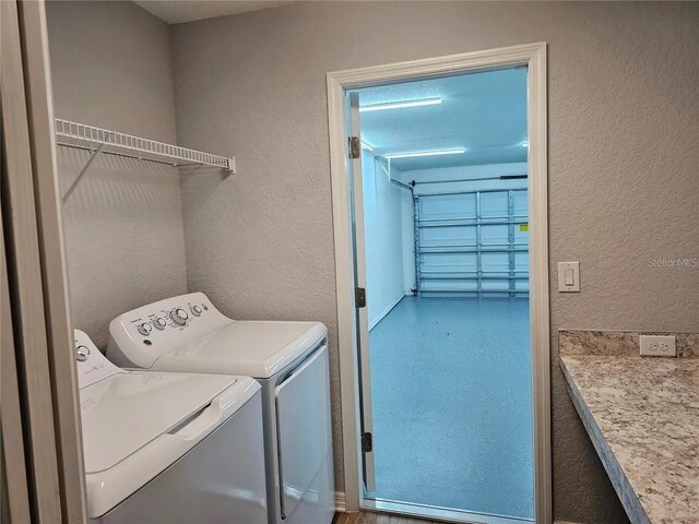 laundry area featuring independent washer and dryer