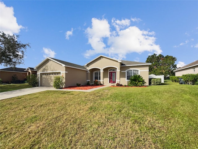 ranch-style house featuring a garage and a front lawn