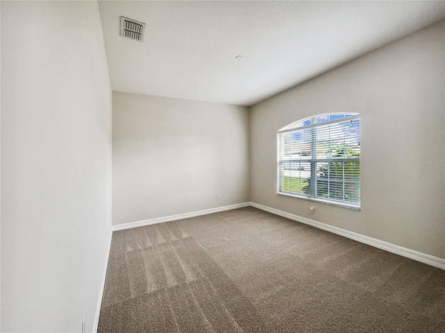 unfurnished room with carpet floors