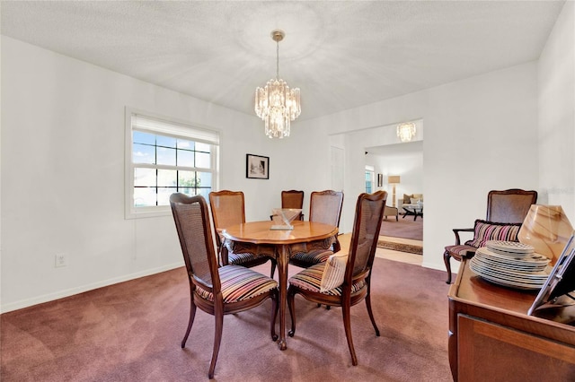 734 Riverbend Blvd, Longwood, FL 32779 - dining room with a chandelier, carpet flooring, and baseboards
