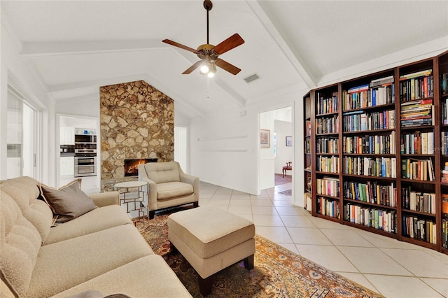 734 Riverbend Blvd, Longwood, FL 32779 - living area featuring ceiling fan, tile patterned flooring, and a stone fireplace