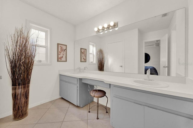 734 Riverbend Blvd, Longwood, FL 32779 - full bath featuring double vanity, tile patterned flooring, ensuite bath, and baseboards