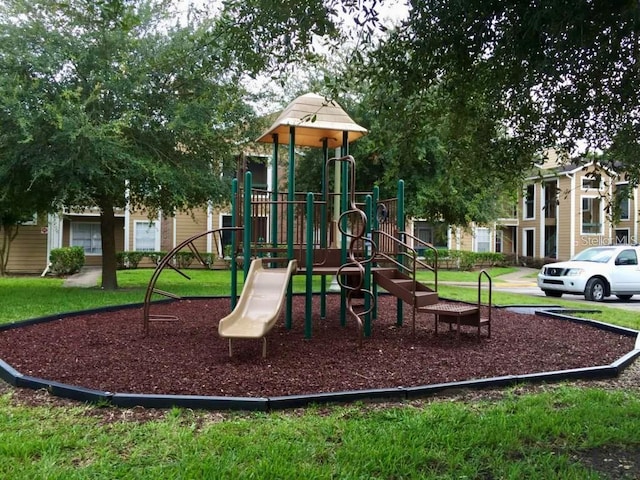 view of jungle gym with a yard