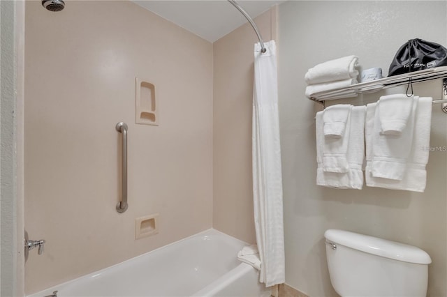 bathroom with toilet and shower / bath combination with curtain