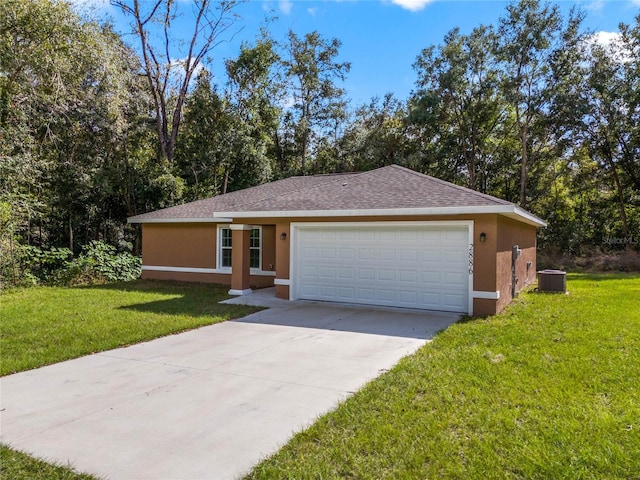 ranch-style home with a front yard, central AC, and a garage