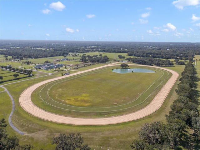 bird's eye view featuring a water view and a rural view