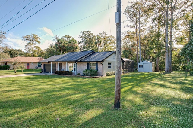 single story home featuring a front yard and a shed