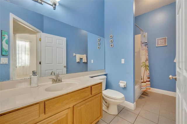 full bathroom featuring tile patterned floors, toilet, vanity, a textured ceiling, and shower / bathtub combination with curtain