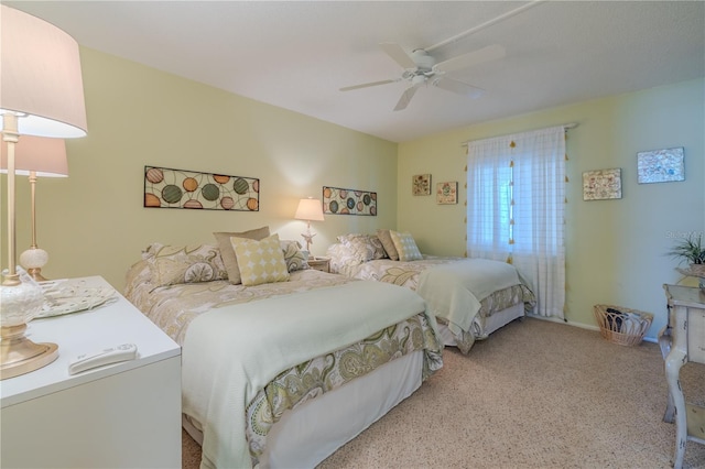 bedroom featuring ceiling fan and light colored carpet