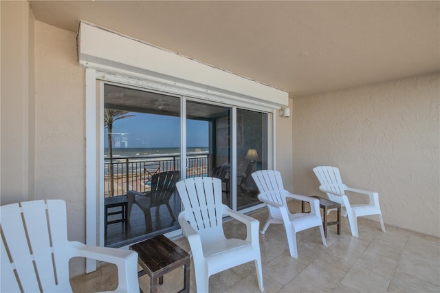 view of patio / terrace featuring a water view