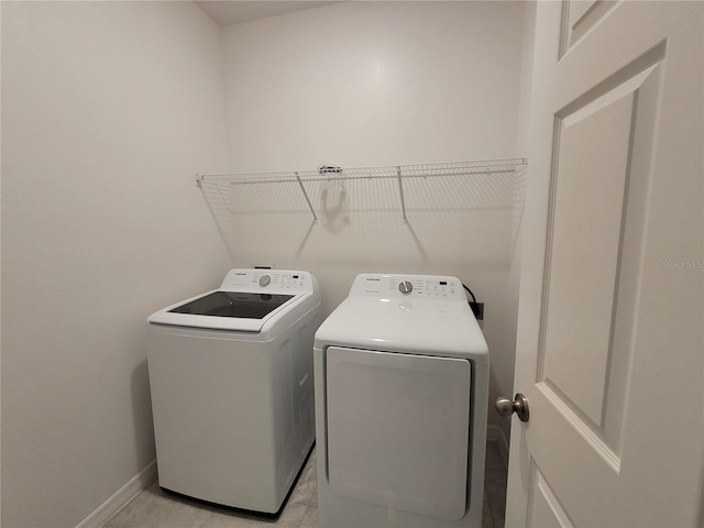 laundry area with washer and dryer