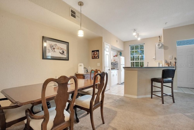 view of carpeted dining room