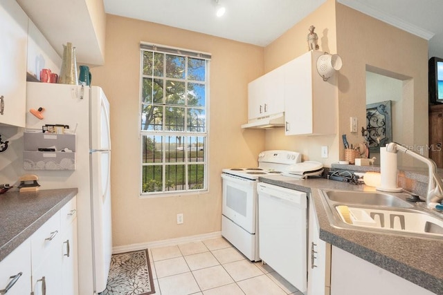 kitchen with white cabinetry, sink, light tile patterned floors, and white appliances