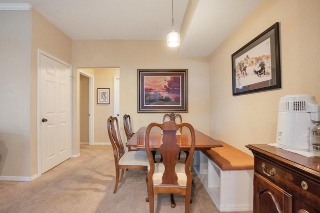 view of carpeted dining area